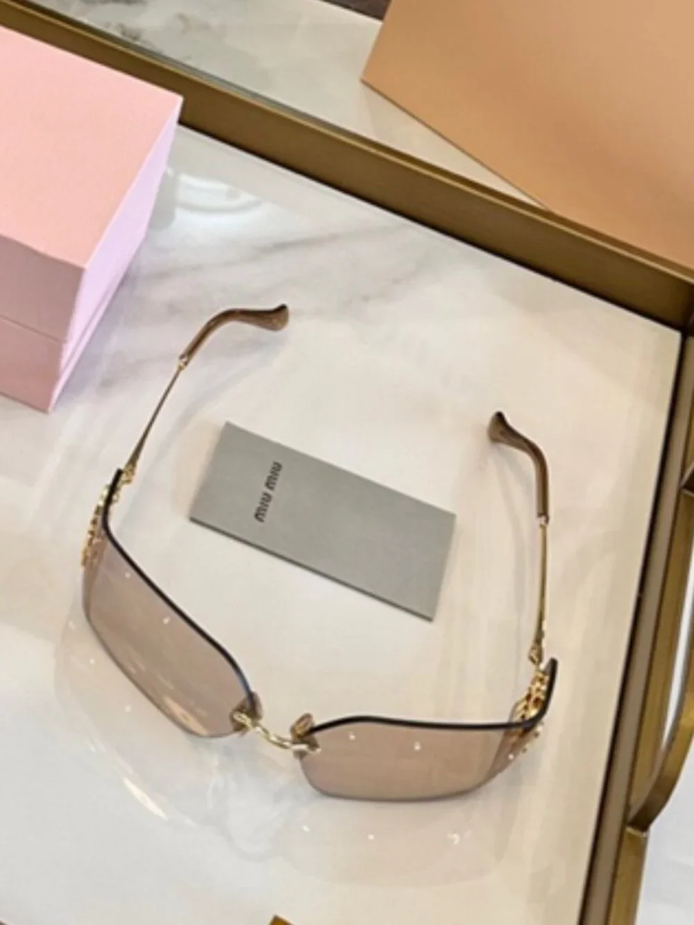 Miu Miu Rimless Square Sunglasses Logo Detail